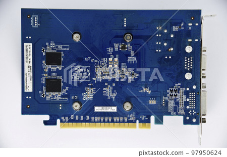 Electronic graphics card board with chips and radio elements. The reverse side of the video card. Transistors and capacitors. Electronic graphics card board with chips and radio elements. The reverse side of the video card. Transistors and capacitors. 97950624