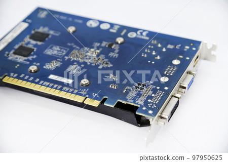 Electronic graphics card board with chips and radio elements. The reverse side of the video card. Transistors and capacitors. 97950625