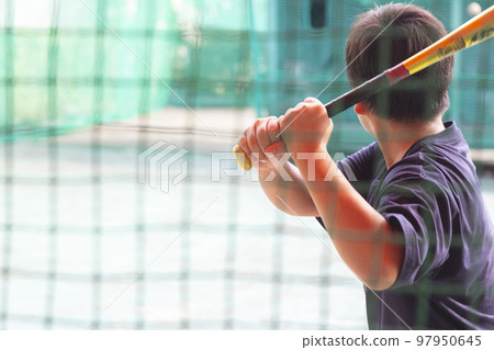 boy practicing batting 97950645