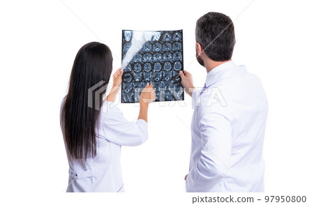 doctor radiologist at radiology with xray. doctor radiologist look at xray isolated on white doctor radiologist at radiology with xray. doctor radiologist look at xray isolated on white 97950800