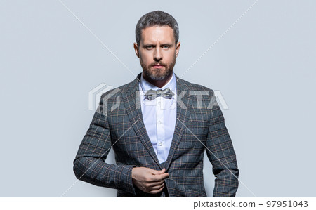portrait of guy wear tuxedo formal suit. guy in tuxedo isolated on grey background. portrait of guy wear tuxedo formal suit. guy in tuxedo isolated on grey background. 97951043