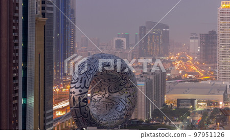 Museum of the Future exhibition space aerial day to night timelapse with iconic torus shape Museum of the Future exhibition space aerial day to night timelapse with iconic torus shape 97951126