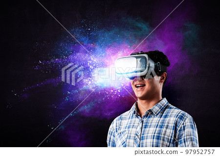 man wearing virtual reality goggles man wearing virtual reality goggles 97952757