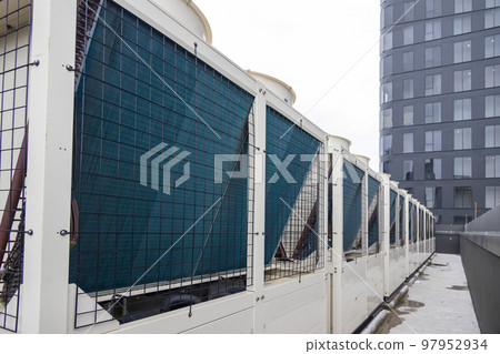 Air conditioner compressor installed on roof building.  97952934