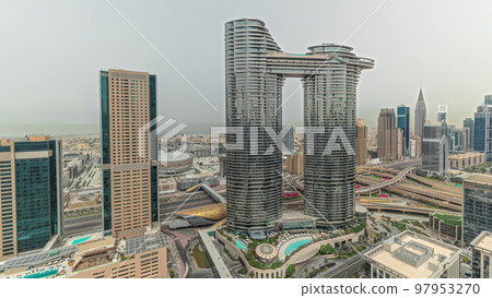 Pnorama showing futuristic Dubai Downtown and finansial district skyline aerial timelapse. 97953270