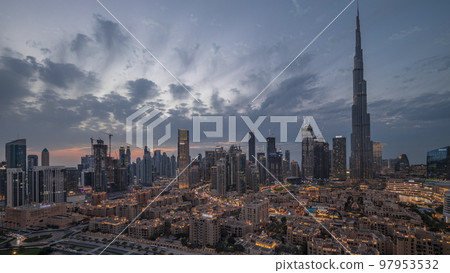 Dubai Downtown day to night transition timelapse with tallest skyscraper and other towers 97953532
