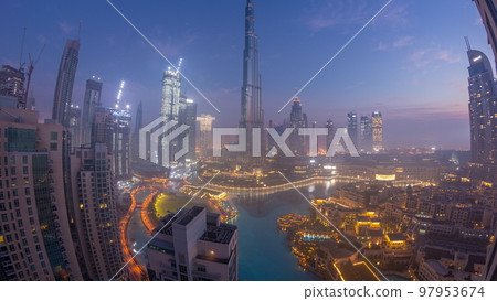 Aerial view of Dubai city early morning during fog night to day timelapse. Aerial view of Dubai city early morning during fog night to day timelapse. 97953674