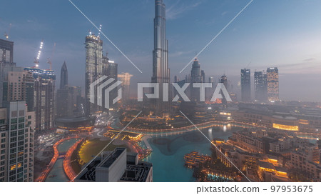 Aerial view of Dubai city early morning during fog night to day timelapse. Aerial view of Dubai city early morning during fog night to day timelapse. 97953675