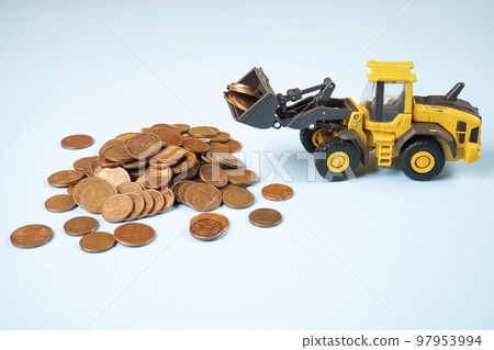 a bulldozer moving Euro cents coins 97953994