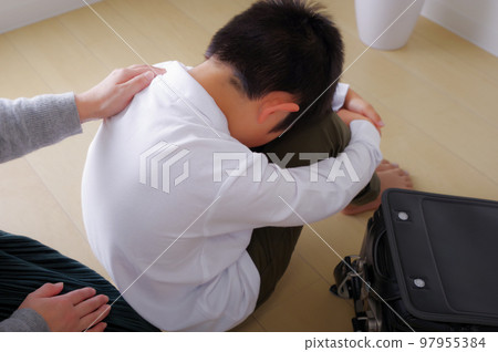 A painful elementary school boy and his mother A painful elementary school boy and his mother 97955384
