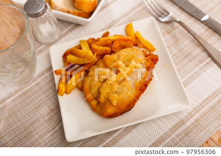 Goat cheese and pepper booklets with fries Goat cheese and pepper booklets with fries 97956306
