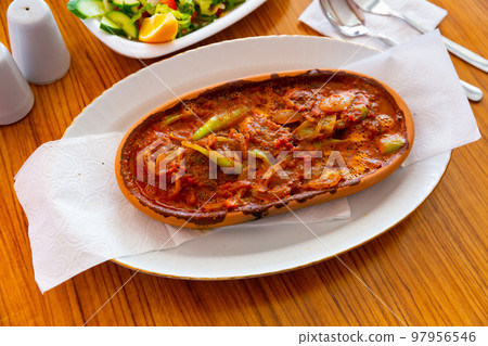 Izmir kofte, turkish dish of spicy meatballs Izmir kofte, turkish dish of spicy meatballs 97956546