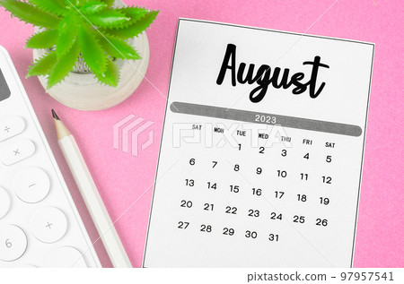 The August 2023 Monthly calendar for 2023 year with calculator on pink background. The August 2023 Monthly calendar for 2023 year with calculator on pink background. 97957541