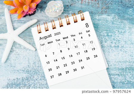 The August 2023 Monthly desk calendar for 2023 year on old blue wooden background. The August 2023 Monthly desk calendar for 2023 year on old blue wooden background. 97957624