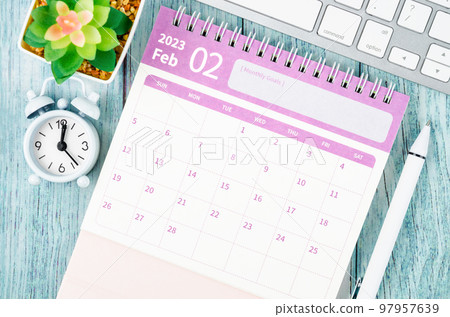 The February 2023 Monthly desk calendar for the organizer to plan 2023 year on wooden table. The February 2023 Monthly desk calendar for the organizer to plan 2023 year on wooden table. 97957639
