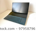 dual screen laptop on desk 97958796