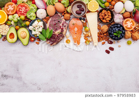 Ketogenic low carbs diet concept. Ingredients for healthy foods selection set up on white concrete background. 97958983