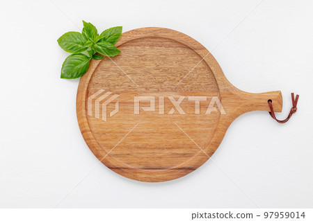 Pizza dough in wooden pizza platter set up on white wooden . Pizza tray on white wooden background flat lay and copy space. 97959014