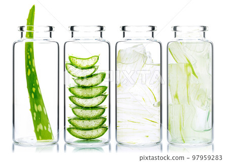 Homemade skin care aloe vera and aloe vera gel in glass bottles isolated on white background. 97959283