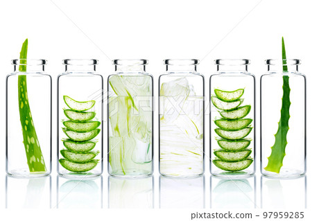 Homemade skin care aloe vera and aloe vera gel in glass bottles isolated on white background. 97959285