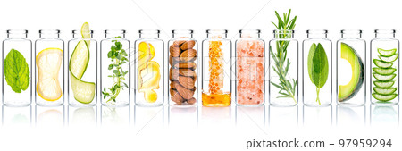 Homemade skin care with natural ingredients avocado ,aloe vera ,cucumber ,himalayan salt ,honeycomb ,almonds, ginger slice and rosemary in glass bottles isolate on white background. Homemade skin care with natural ingredients avocado ,aloe vera ,cucumber ,himalayan salt ,honeycomb ,almonds, ginger slice and rosemary in glass bottles isolate on white background. 97959294