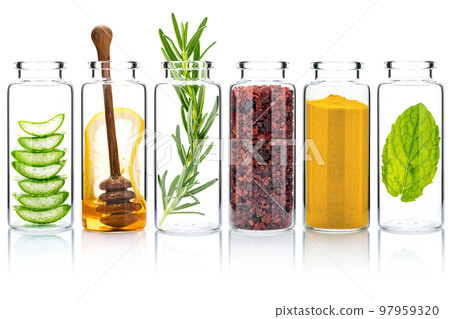 The glass bottle of homemade skin care and body scrubs with natural ingredients aloe vera ,himalayan salt ,peppermint ,rosemary ,turmeric and honey isolate on white background. 97959320