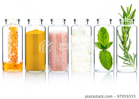 The glass bottle of homemade skin care and body scrubs with natural ingredients aloe vera ,himalayan salt ,peppermint ,rosemary ,turmeric and honey isolate on white background. The glass bottle of homemade skin care and body scrubs with natural ingredients aloe vera ,himalayan salt ,peppermint ,rosemary ,turmeric and honey isolate on white background. 97959355