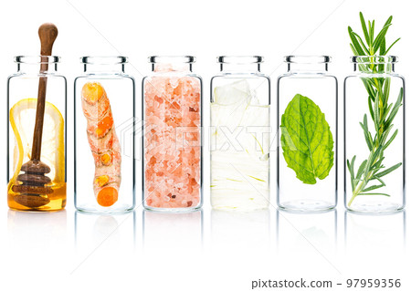 The glass bottle of homemade skin care and body scrubs with natural ingredients aloe vera ,himalayan salt ,peppermint ,rosemary ,turmeric and honey isolate on white background. The glass bottle of homemade skin care and body scrubs with natural ingredients aloe vera ,himalayan salt ,peppermint ,rosemary ,turmeric and honey isolate on white background. 97959356