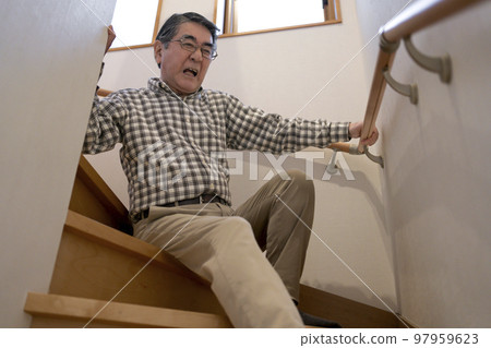 Senior man falling down the stairs Senior man falling down the stairs 97959623