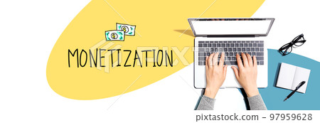 Monetization with person using a laptop Monetization with person using a laptop 97959628