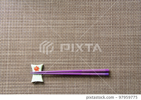 brown placemats and purple chopsticks 97959775