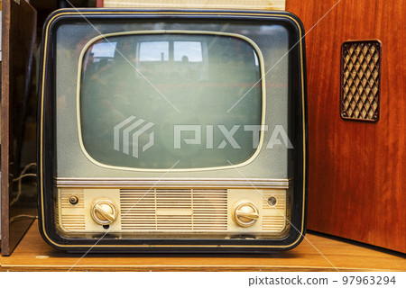 Vintage television . Old television set is placed in the electrical stores 97963294