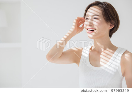 Beauty image Portrait of a woman wearing a tank top 97965249