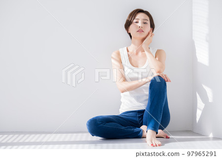 Beauty image Portrait of a woman wearing a tank top 97965291