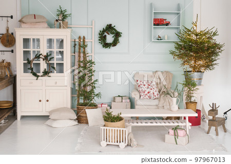 Cozy festive living room decorated for Christmas and New Year 97967013