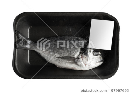 sea bream in black transparent black vacuum packaging with blank white label isolated on background 97967693