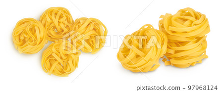 Raw tagliatelle pasta isolated on white background with full depth of field. Top view. Flat lay 97968124