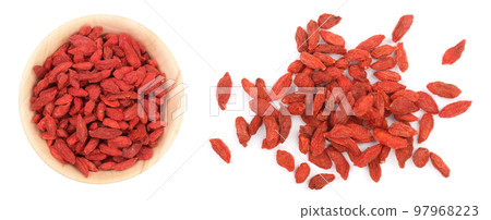 Dried goji berries in wooden bowl Isolated on white background 97968223