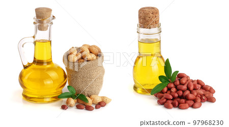 peanut oil in a glass bottle with peanuts in bag 97968230