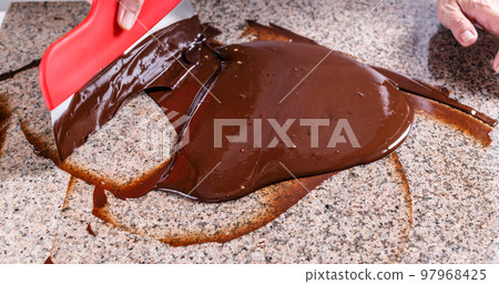 Smudging melted chocolate 97968425