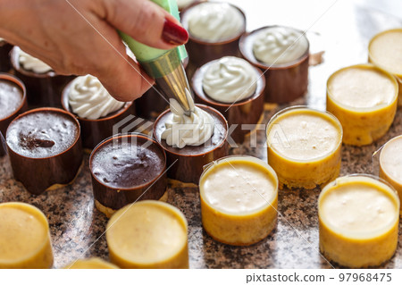 Mini cake with a whipped cream Mini cake with a whipped cream 97968475