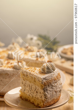 Nut cake with whipped cream Nut cake with whipped cream 97968617