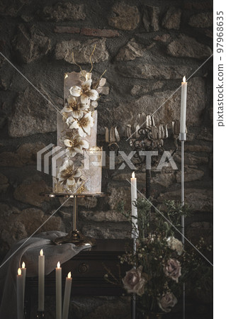 Still life of delicious three tiered wedding cake Still life of delicious three tiered wedding cake 97968635