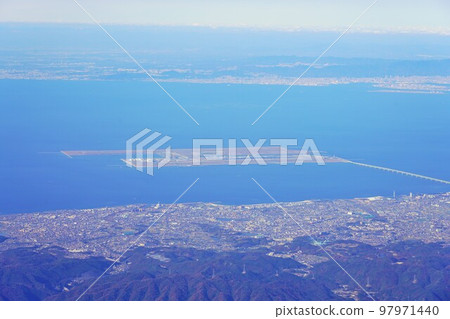 View of Kansai Airport from the Wakayama side in the foreground and Kobe in the distance View of Kansai Airport from the Wakayama side in the foreground and Kobe in the distance 97971440