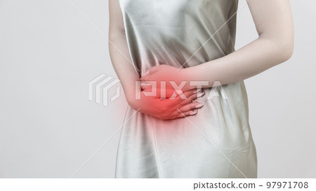 Menstrual pain, woman with stomachache suffering from pms , endometriosis, cystitis and other diseases of the urinary system, painful area highlighted in red 97971708