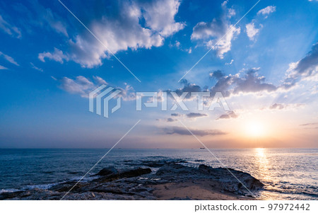 The sun setting over the Nomazaki lighthouse in Aichi The sun setting over the Nomazaki lighthouse in Aichi 97972442