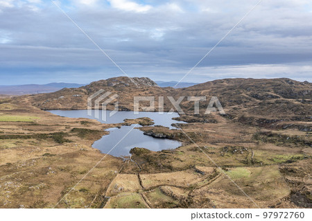 Aerial view of Agnish Lough by Maghery, Dungloe - County Donegal - Ireland. 97972760