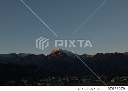 Hakushu Town, Hokuto City, Morgenroth mountain range and still dark cityscape Hakushu Town, Hokuto City, Morgenroth mountain range and still dark cityscape 97978079