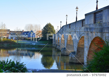 Chertsey old bridge local pub river view. Stock Photo