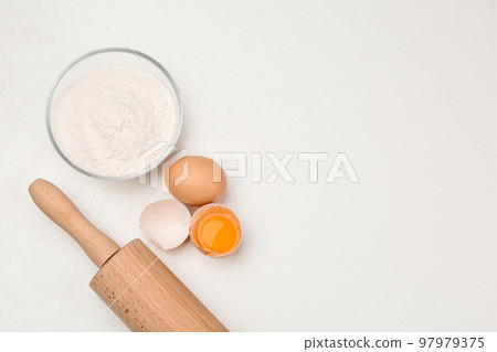 Flat lay composition with raw eggs on white table, space for text. Baking pie Flat lay composition with raw eggs on white table, space for text. Baking pie 97979375